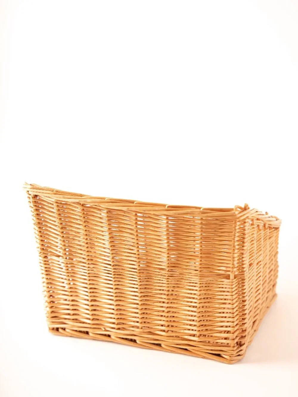 Natural wicker rectangular storage basket with a tapered design